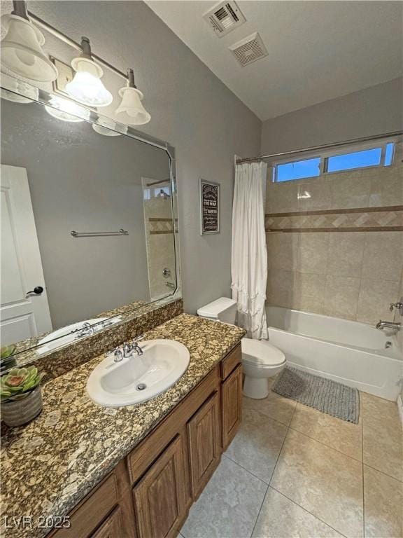 full bathroom with toilet, vanity, tile patterned flooring, and shower / bath combo with shower curtain