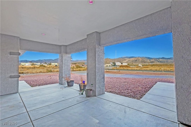 view of patio with a mountain view