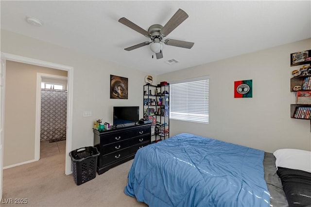 carpeted bedroom featuring ceiling fan