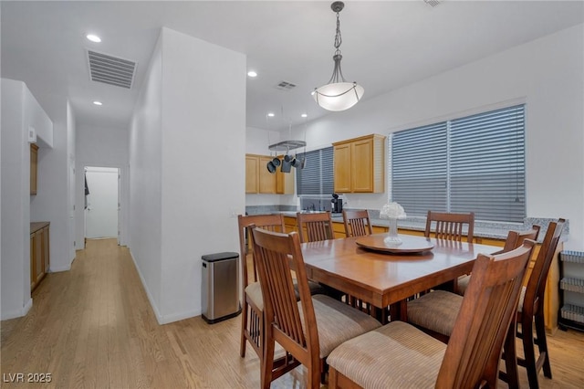 dining area featuring light hardwood / wood-style flooring