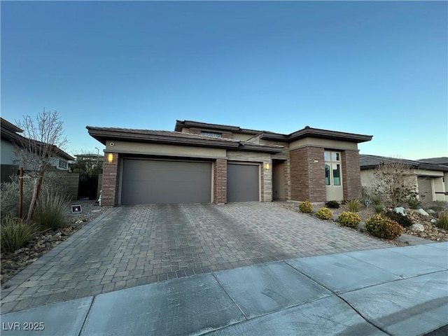 prairie-style house with a garage