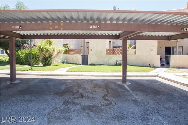 view of car parking featuring a carport