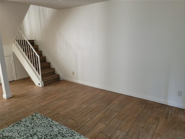 interior space with a textured ceiling