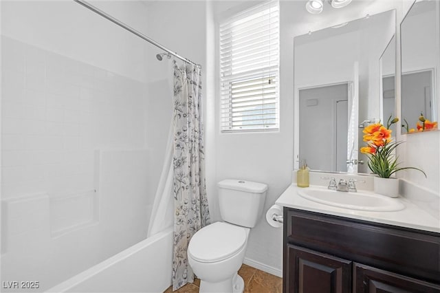 full bathroom with toilet, vanity, and shower / tub combo