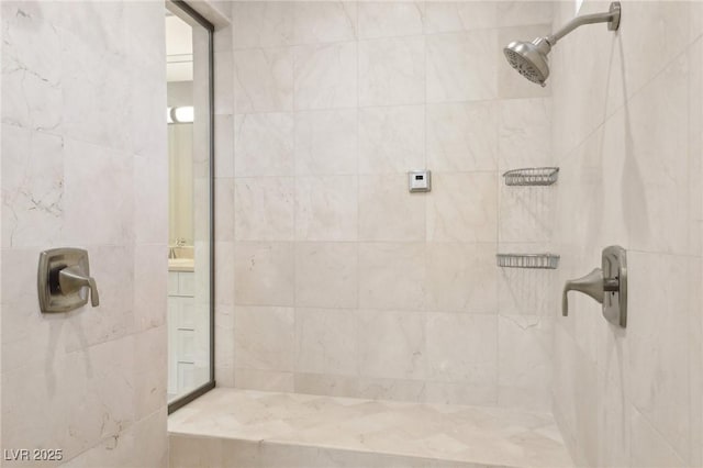 bathroom with a tile shower