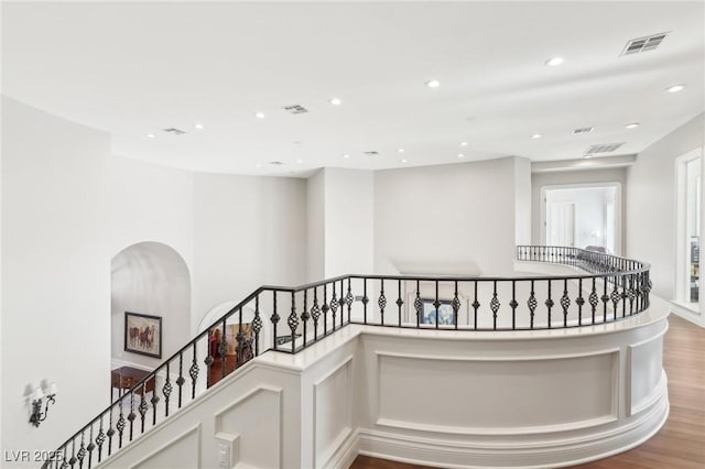 corridor featuring light hardwood / wood-style flooring