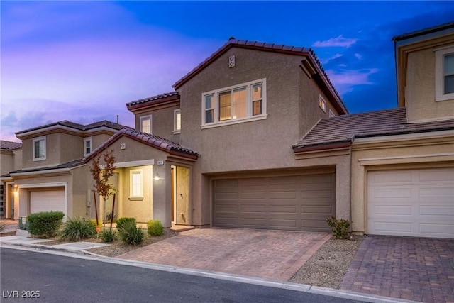 view of front of property with a garage