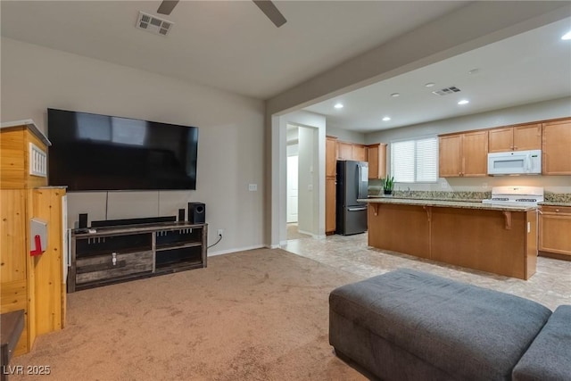 interior space featuring ceiling fan