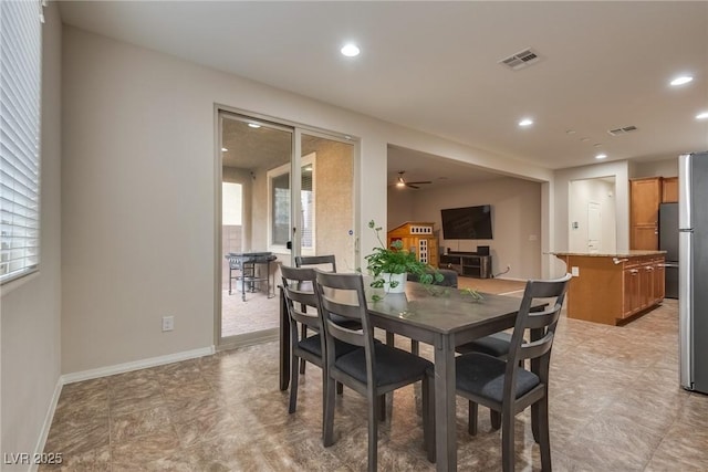 dining area with ceiling fan