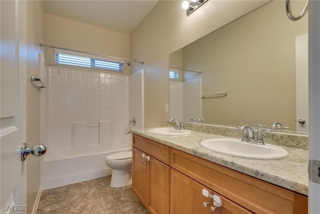 full bathroom with toilet, vanity, and bathing tub / shower combination