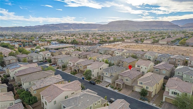 drone / aerial view featuring a mountain view