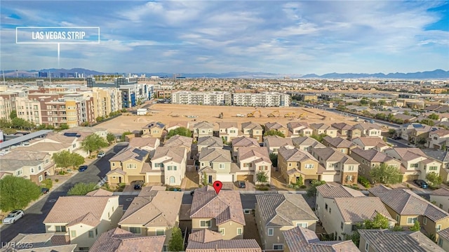 drone / aerial view featuring a mountain view