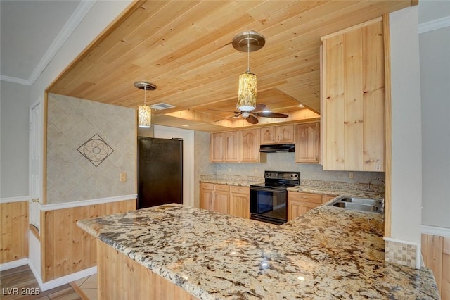 kitchen with kitchen peninsula, light brown cabinets, hanging light fixtures, black appliances, and sink