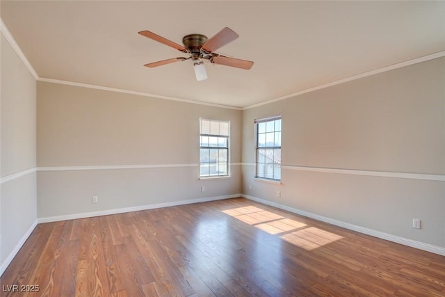 unfurnished room featuring ceiling fan, wood-type flooring, and crown molding