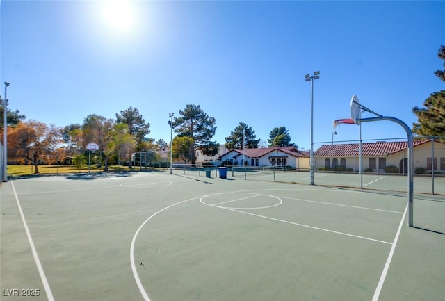 view of sport court with tennis court