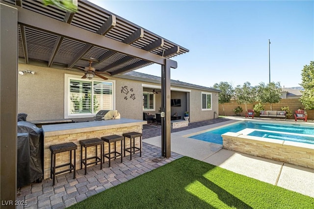 view of pool with an outdoor bar, ceiling fan, a pergola, a patio, and a grill