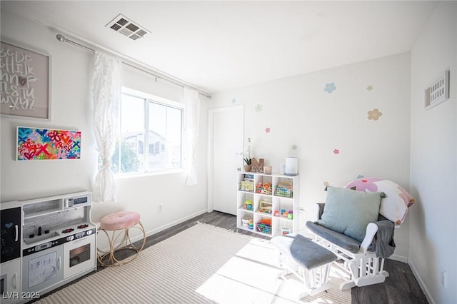 rec room featuring hardwood / wood-style flooring