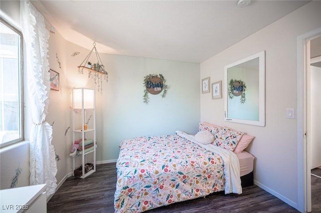 bedroom featuring dark hardwood / wood-style flooring