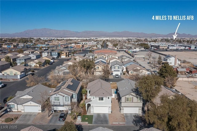 bird's eye view with a mountain view