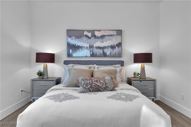 bedroom featuring dark wood-type flooring