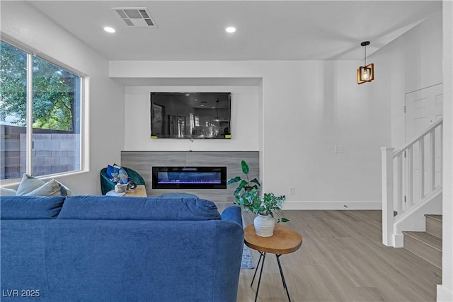 living room with wood-type flooring