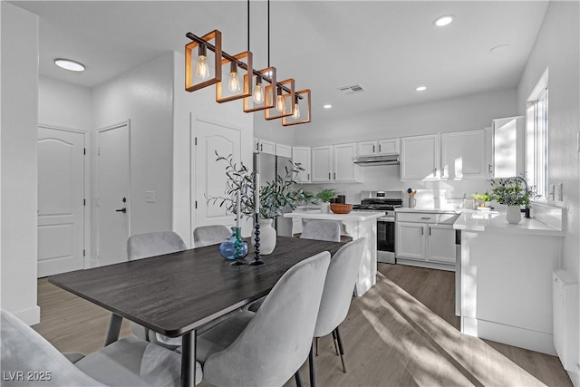 dining room featuring dark hardwood / wood-style floors