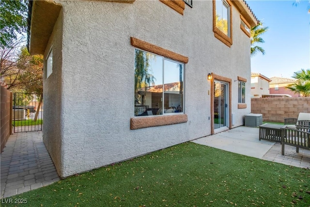 rear view of house with a patio area