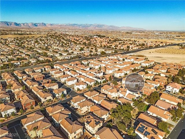 bird's eye view with a mountain view