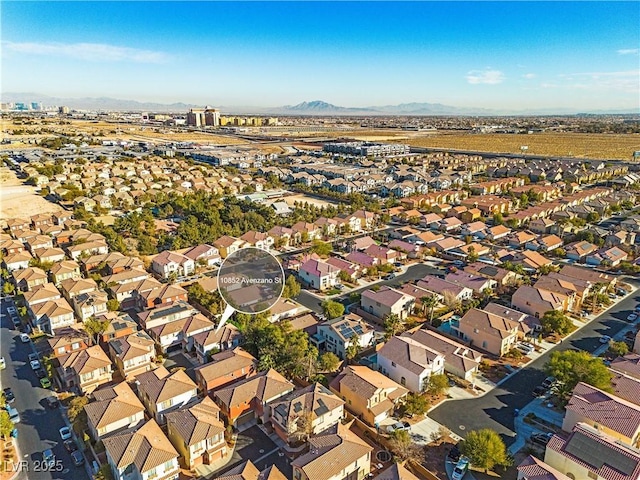 drone / aerial view featuring a mountain view