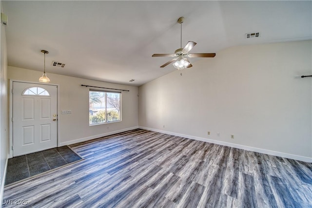 foyer entrance featuring ceiling fan, hardwood / wood-style floors, and lofted ceiling