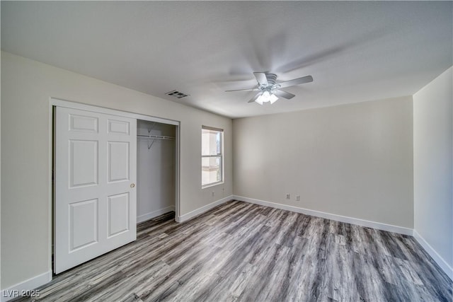 unfurnished bedroom featuring a closet, ceiling fan, and light hardwood / wood-style floors