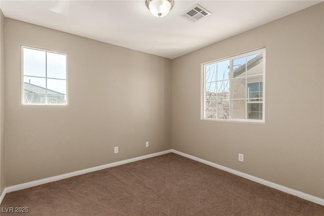 view of carpeted spare room