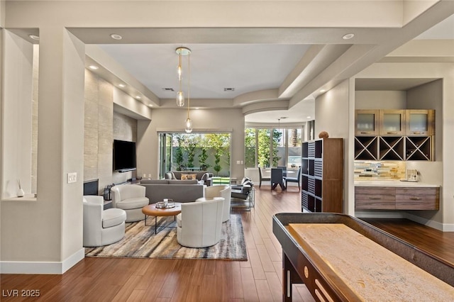 living room with dark wood-type flooring