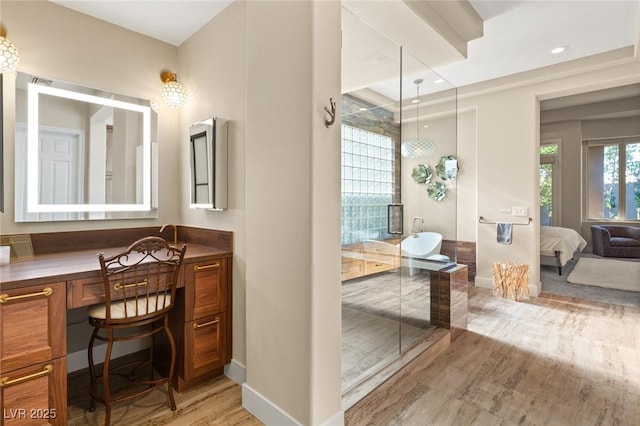 bathroom featuring hardwood / wood-style floors and vanity