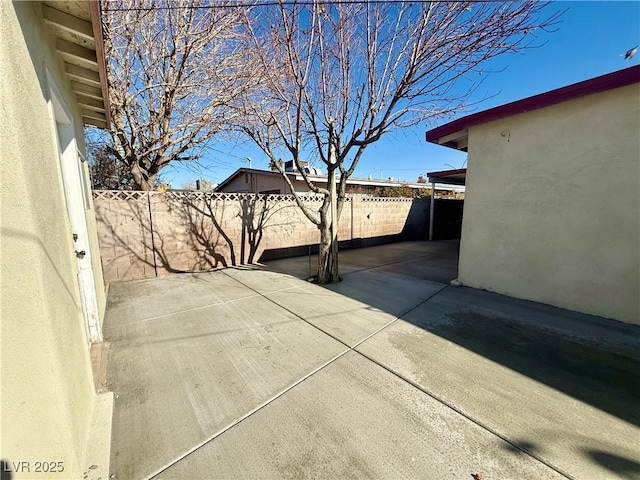 view of patio with fence