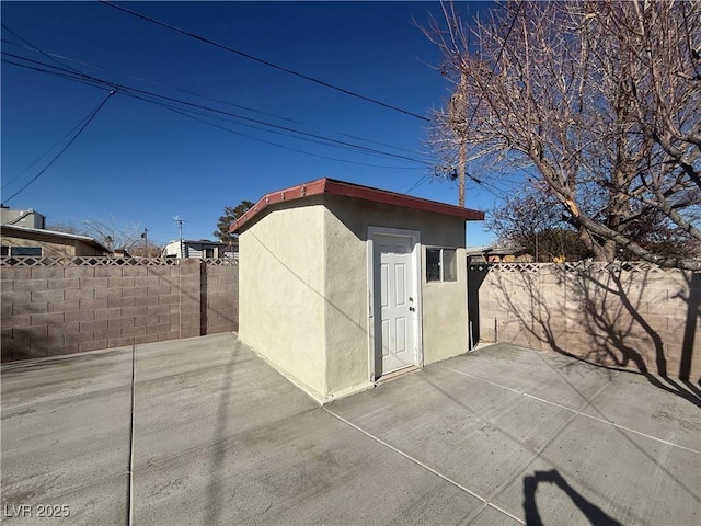 view of shed featuring a fenced backyard