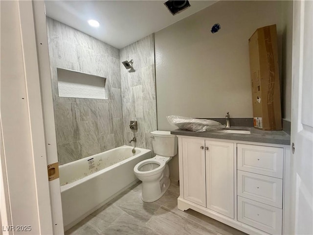 full bath with toilet, washtub / shower combination, and vanity