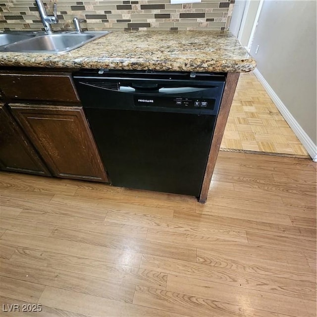 details featuring dark brown cabinetry, black dishwasher, tasteful backsplash, sink, and light hardwood / wood-style flooring