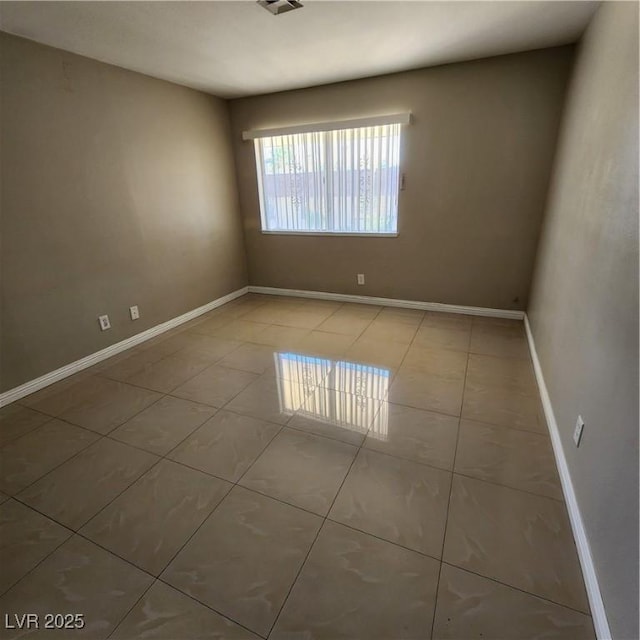 view of tiled empty room