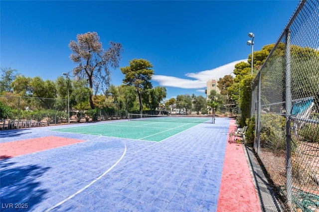 exterior space with tennis court