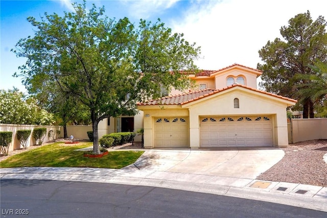 mediterranean / spanish-style home featuring a garage