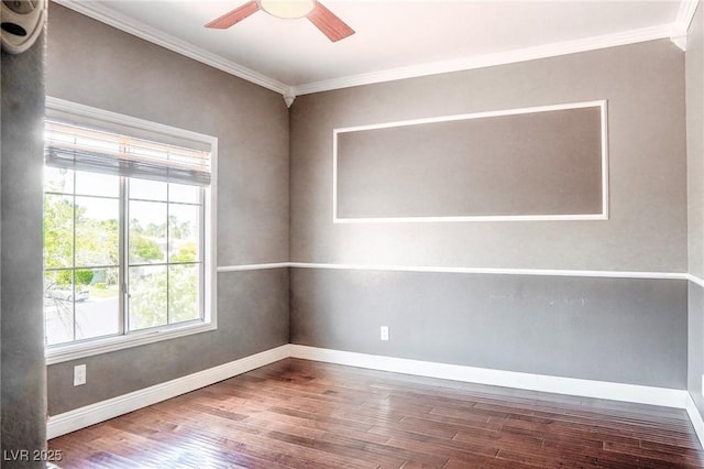 unfurnished room featuring hardwood / wood-style flooring, ornamental molding, and ceiling fan