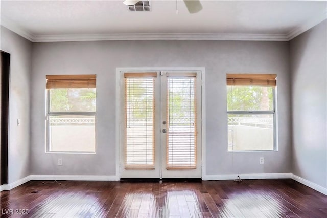 doorway to outside featuring french doors, crown molding, and dark hardwood / wood-style floors