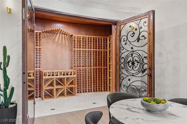 wine room with ornamental molding