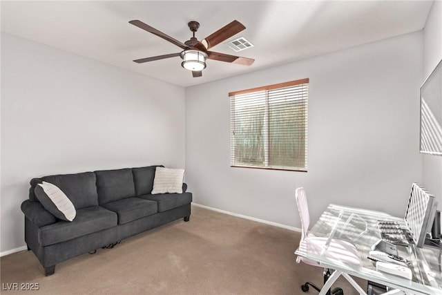 office featuring ceiling fan and carpet