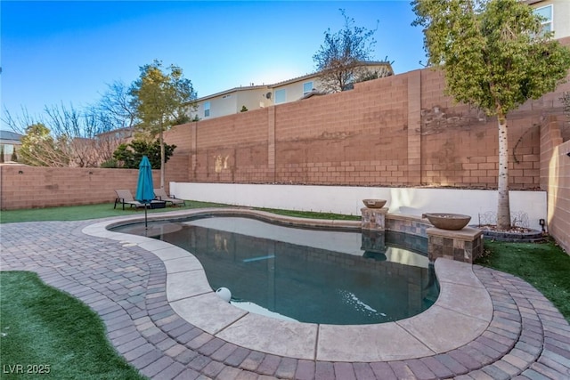 view of pool with a patio