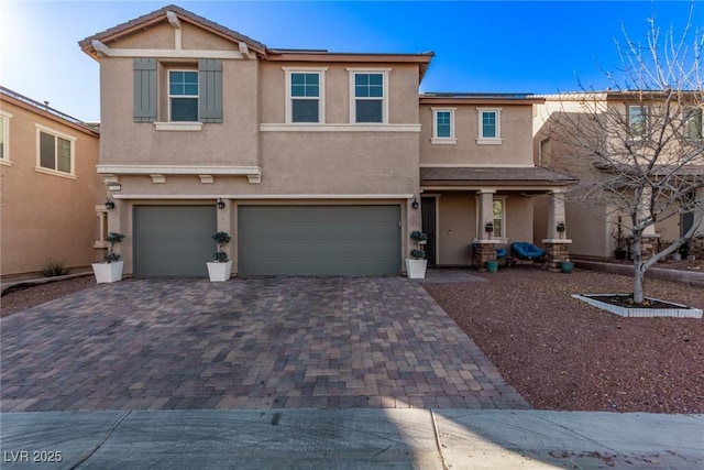 view of front of home featuring a garage