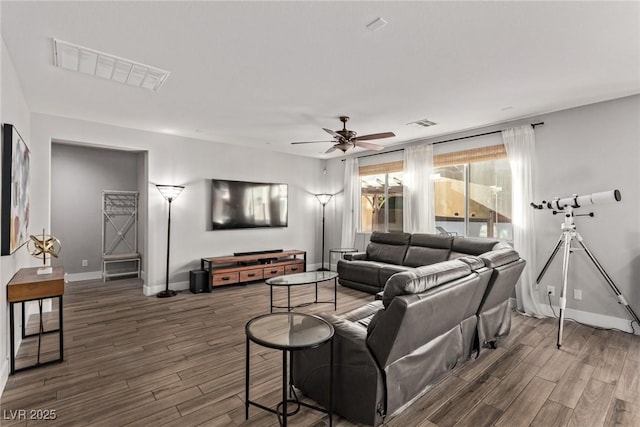 living room featuring ceiling fan