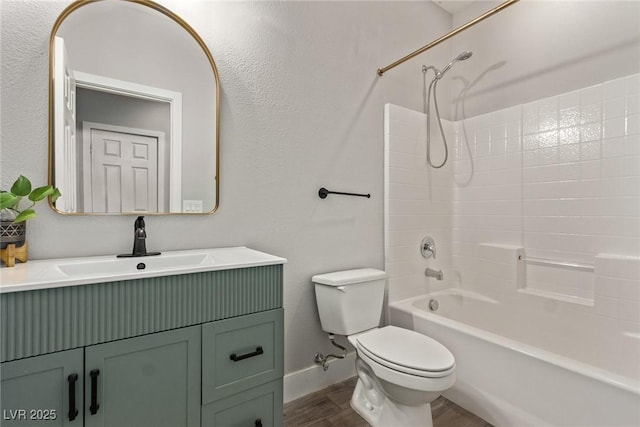 full bathroom featuring vanity, toilet, shower / bath combination, and hardwood / wood-style flooring