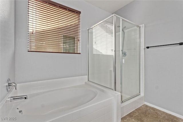 bathroom featuring tile patterned floors and plus walk in shower